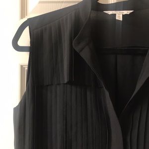 Black blouse with pleats